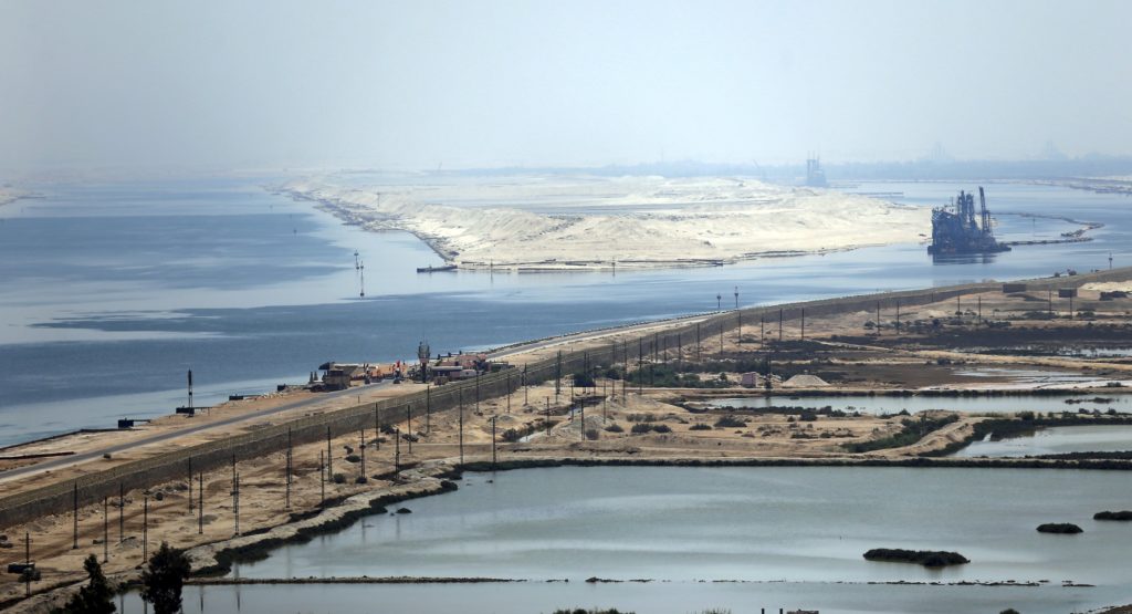 A general view of the Suez Canal from Al Salam "Peace" bridge on the Ismalia desert road before the opening ceremony of the New Suez Canal, in Egypt, August 6, 2015. Egypt will open an expansion to the Suez Canal to great fanfare on Thursday, the centrepiece of President Abdel Fattah al-Sisi's plans to revitalise the country's economy after years of damaging political turmoil. REUTERS/Amr Abdallah Dalsh